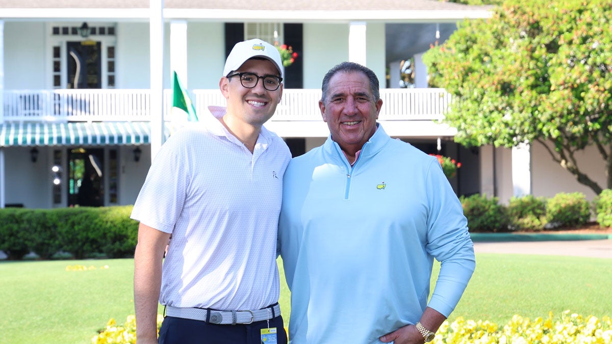 Jake Marsh at the Masters with his dad.