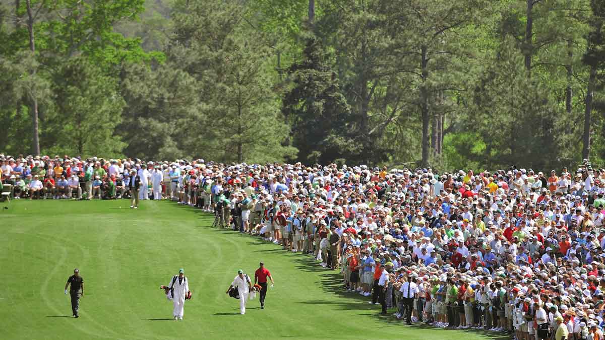 Scenic view of Tiger Woods with caddie Steve Williams and Phil Mickelson with caddie Jim Mackay walking during Sunday play at Augusta National.