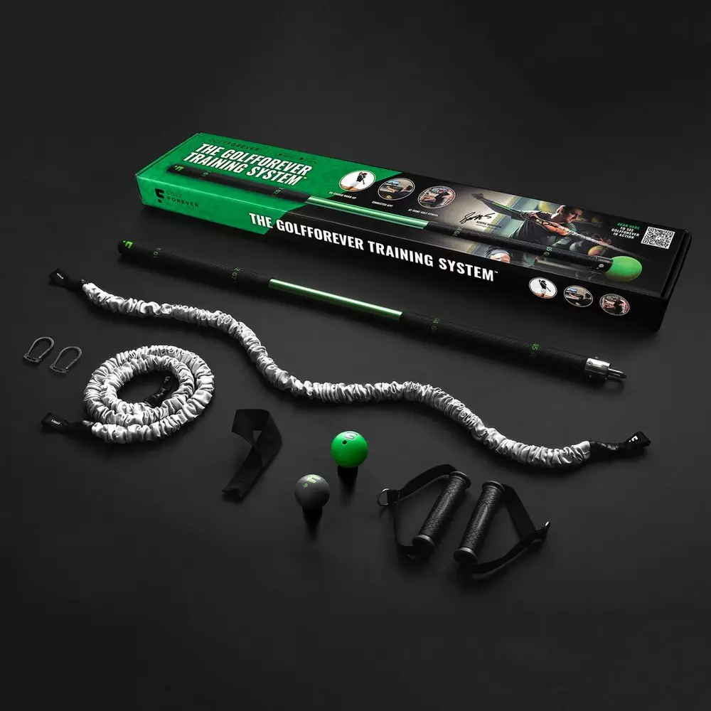 The image shows the GolfForever Training System set, featuring a green and black box, training bar, resistance band, handles, golf ball attachment, carabiners, and accessories—perfect for those seeking best deals under $50 on golf gear.