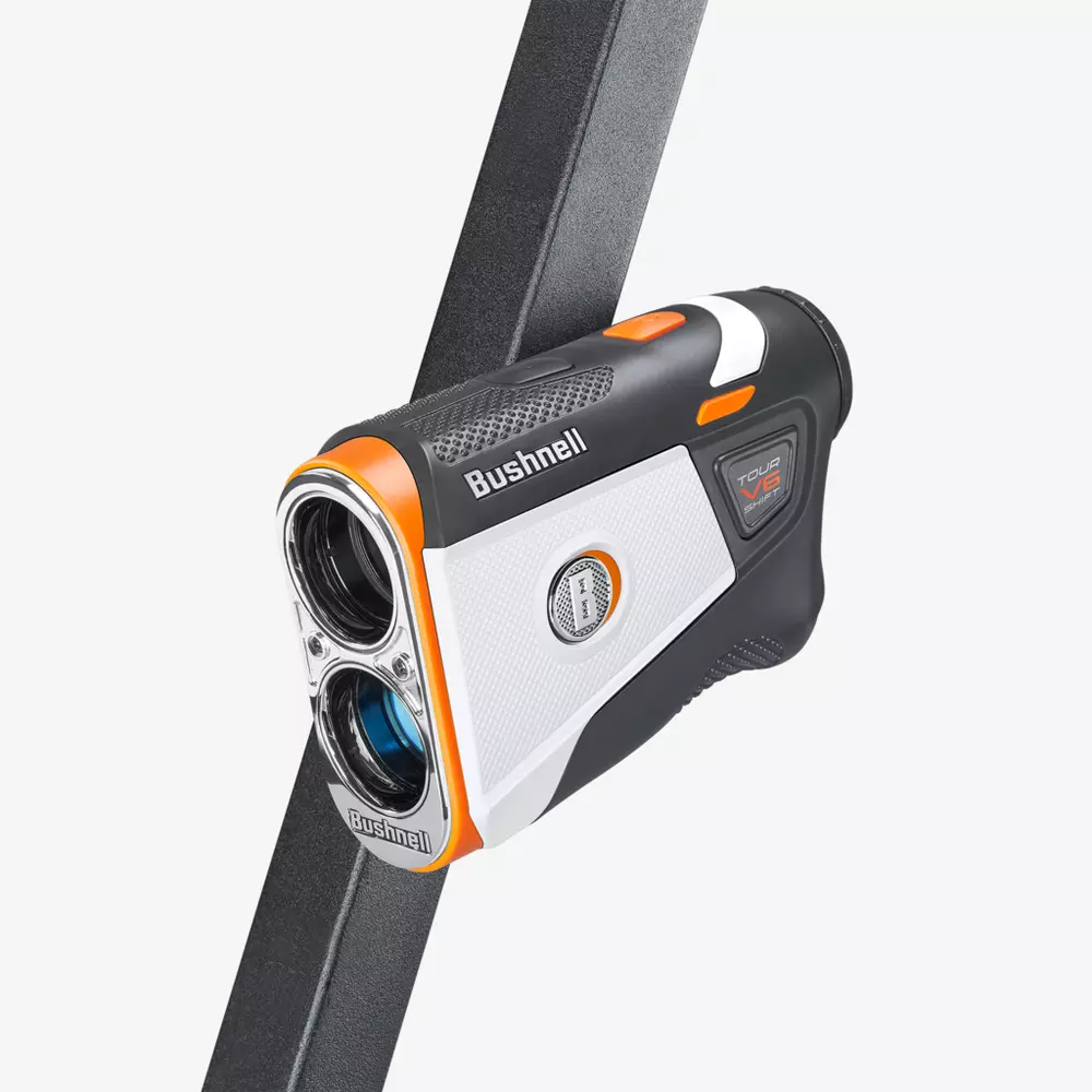 A Bushnell Tour V6 golf rangefinder with a striking black, white, and orange design, featuring dual lenses and a labeled button, is attached to a dark strap against a plain white background—perfect for finding the best deals under $50.