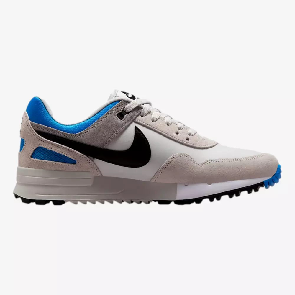 A gray and white athletic sneaker with a black swoosh logo, blue inner lining and heel detail, white laces, and a rugged black and blue outsole—get these stylish kicks now with the best deals under $50, displayed on a white background.
