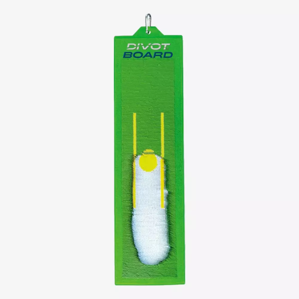 A green rectangular Divot Board golf training aid with a white impact mark and yellow alignment lines, used for practicing and analyzing golf swing paths—now available with some of the best deals under $50.