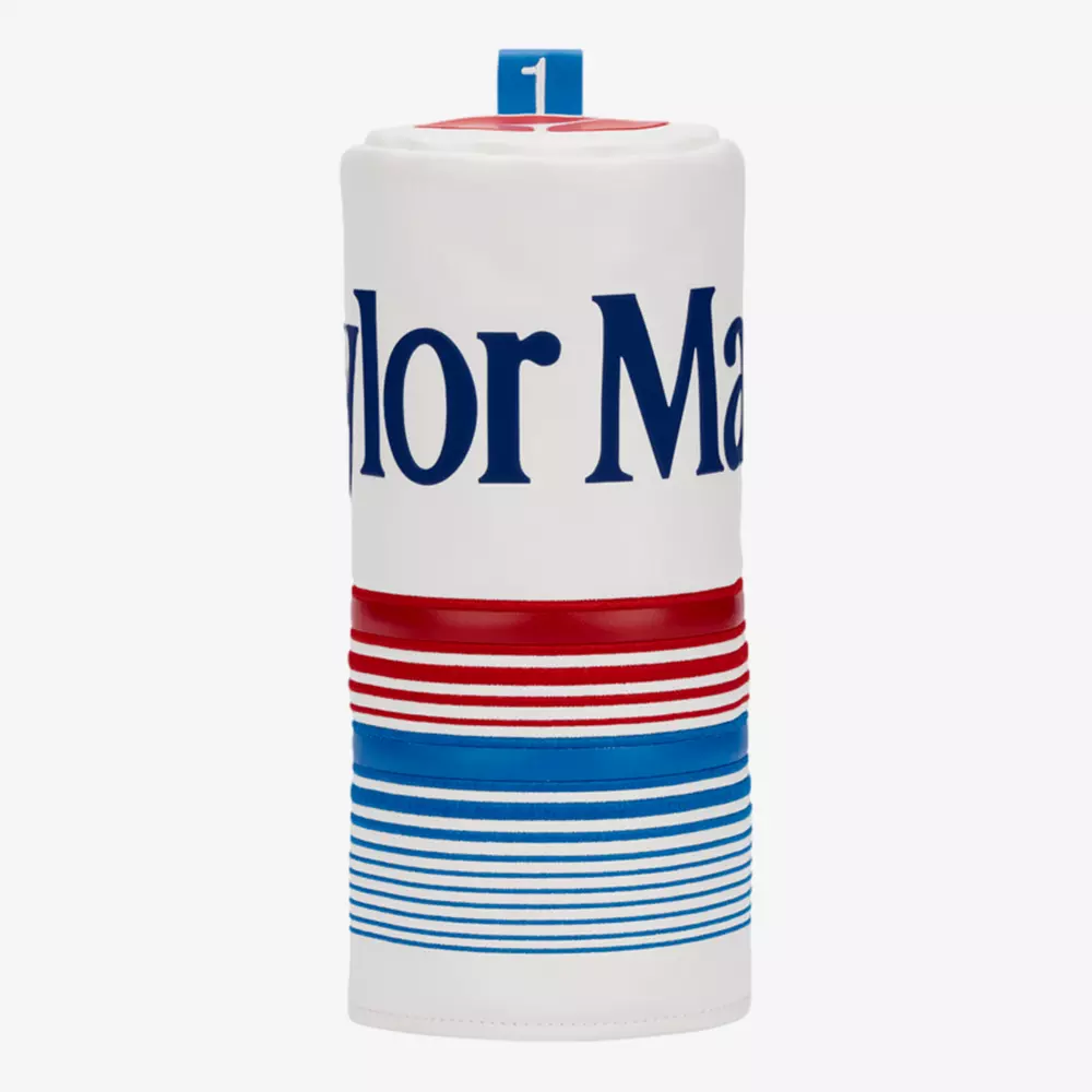 A white golf club headcover with TaylorMade partially visible in blue text, featuring horizontal red and blue stripes and a blue 1 tag on top—perfect for those seeking the best golf deals for $100 or less.