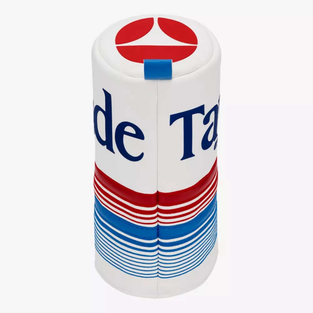 A cylindrical object designed to look like a retro Tab soda can, featuring red, white, and blue horizontal lines and partial text spelling “Tab”—the perfect novelty gift for those who love searching for the best golf deals for $100 or less.