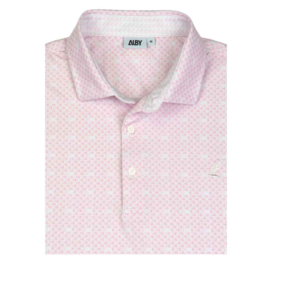 A folded light pink patterned polo shirt with a collar and three buttons. Featuring a subtle white geometric design and small embroidered logo, it's one of the best gift ideas for dads—perfect for Father's Day gifts or golf gifts. Tag shows brand ALBY, size M.