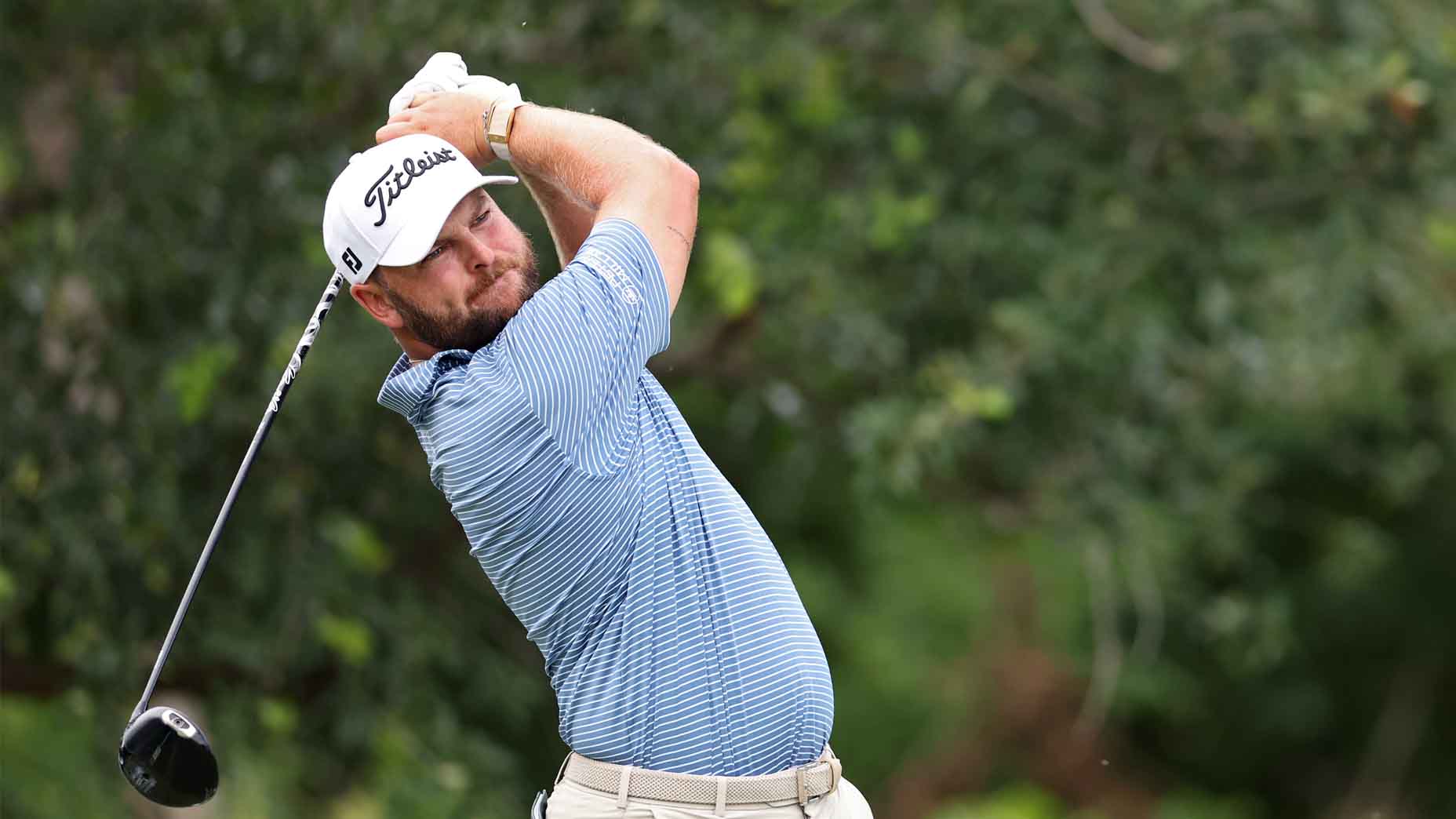Jordan Smith hits a shot at the Charles Schwab Challenge