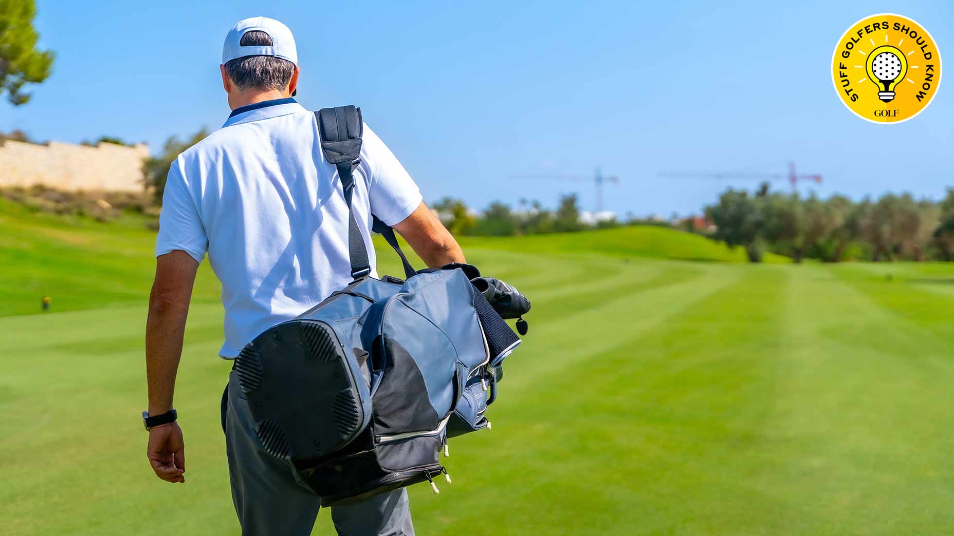 A golfer wearing a white cap and polo shirt walks on a sunny golf course, carrying handy items in his golf bag. The grass is green, the sky is blue, and a yellow Golfers Should Know logo appears in the top right corner.