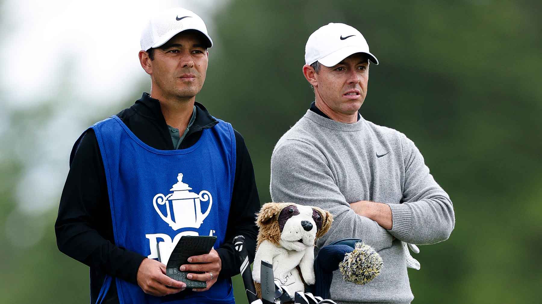rory mcilory and caddie at 2026 championship, waiiting to hit shot