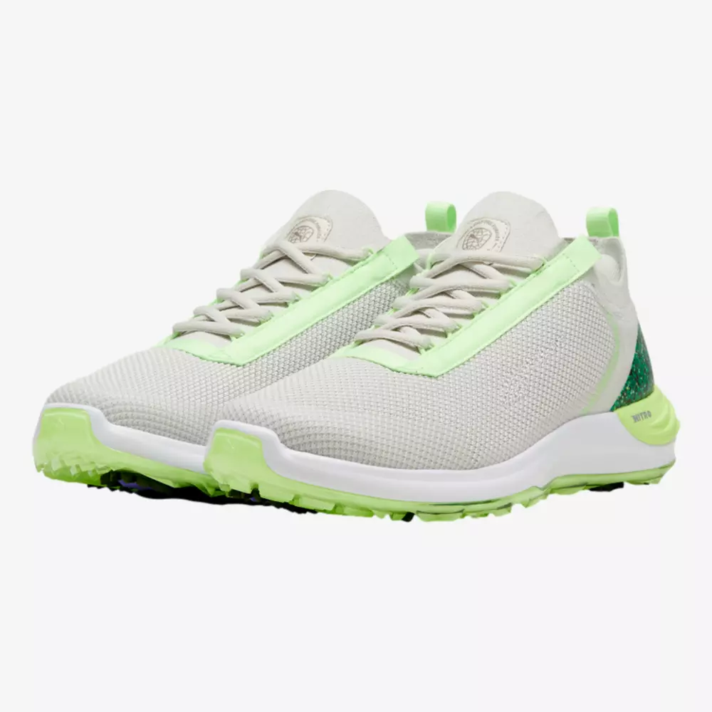A pair of light gray athletic sneakers with neon green accents on the sole, sides, and heel&mdash;perfect for pairing with the best golf smartwatch&mdash;featuring a mesh upper and a textured outsole for grip.