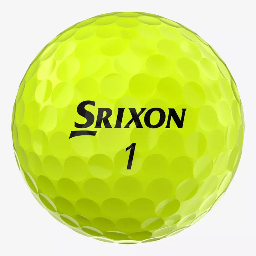 A bright yellow Srixon golf ball with the number 1 printed in black rests against a plain white background&mdash;perfect for pairing with the best golf smartwatch to enhance your game.