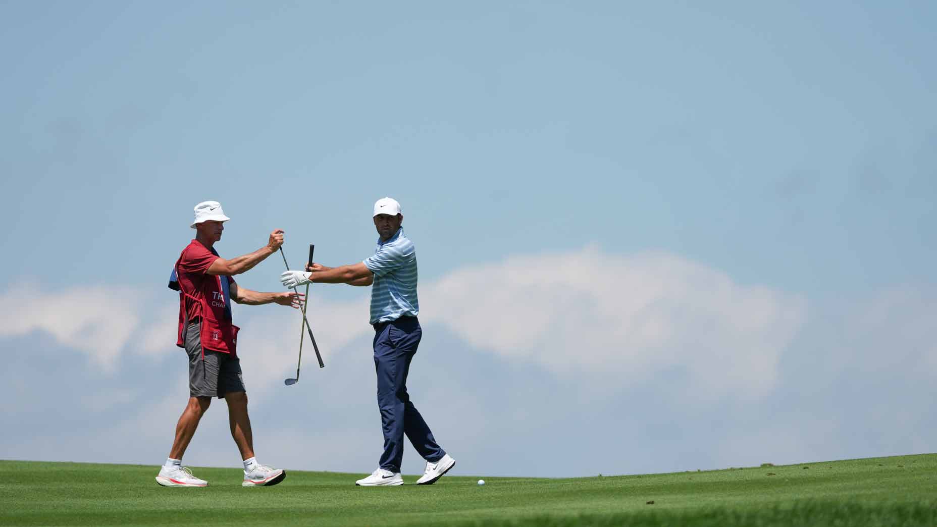 Scottie Scheffler and Ted Scott at the Travelers Championship on Friday.