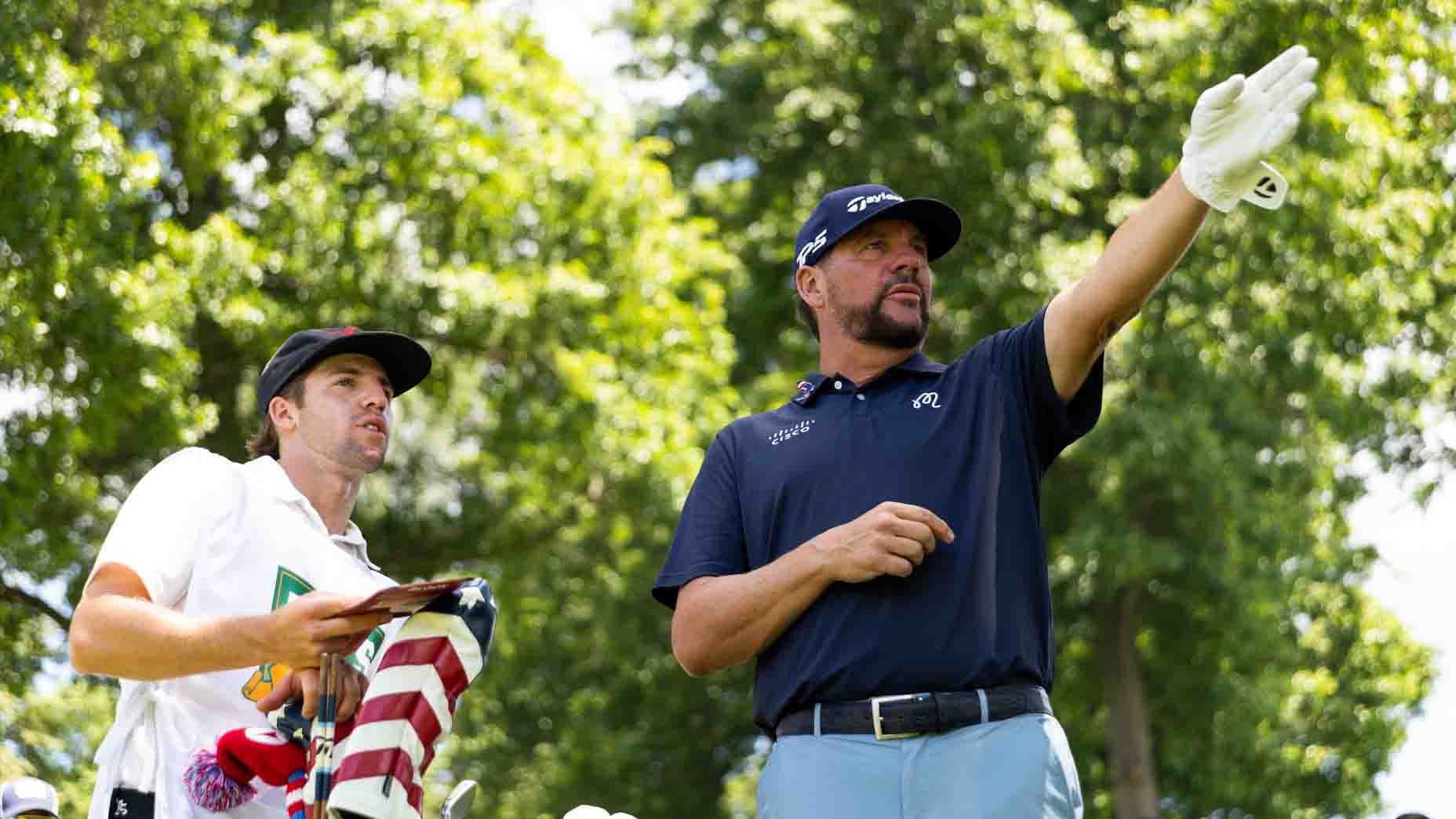 Michael Block talks to his caddie during the Dicks' Open