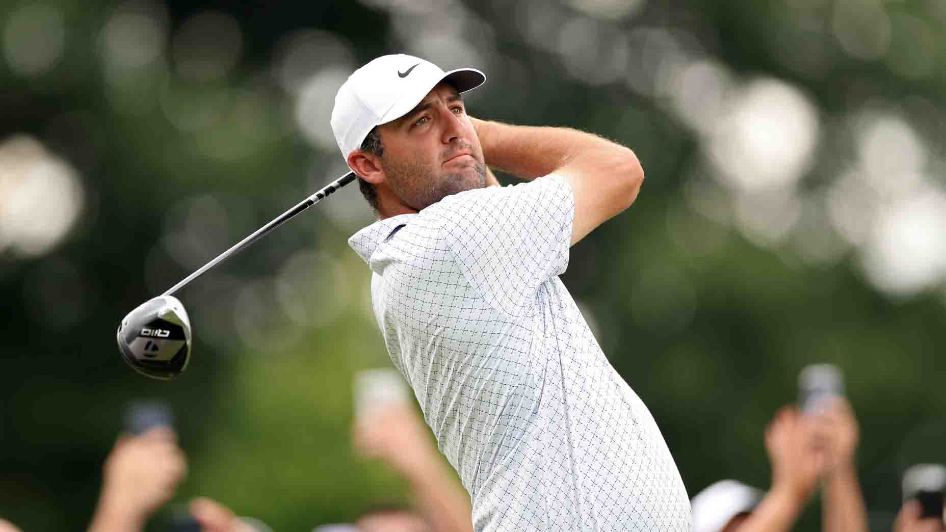 Scottie Scheffler hits a tee shot during the Travelers Championship