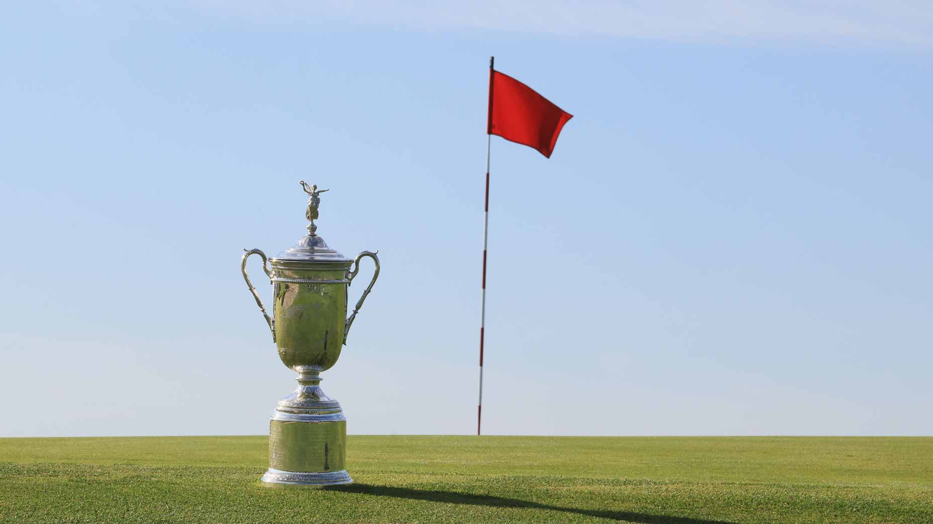 2026 U.S. Open trophy on green at Shinnecock Hills. Find out how to watch the U.S. Open here.