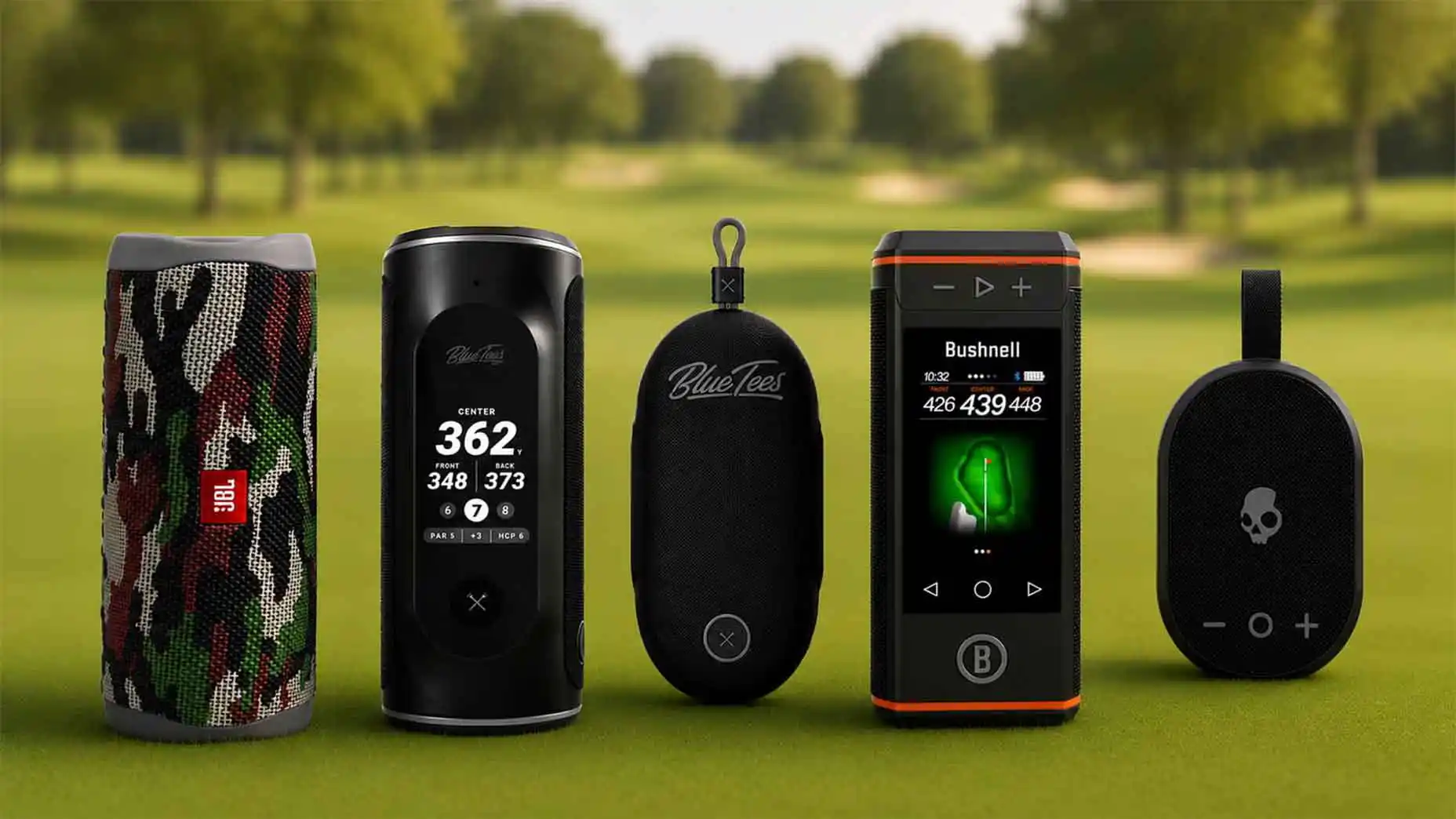 Five portable golf GPS speakers stand in a row on a golf course, each showing various displays and logos, including JBL, Blue Tees, Bushnell, and Skullcandy brands. The background is a blurry fairway with trees. These top-rated models—available at PGA Tour Superstore—combine premium sound quality with cutting-edge GPS features to elevate your game.