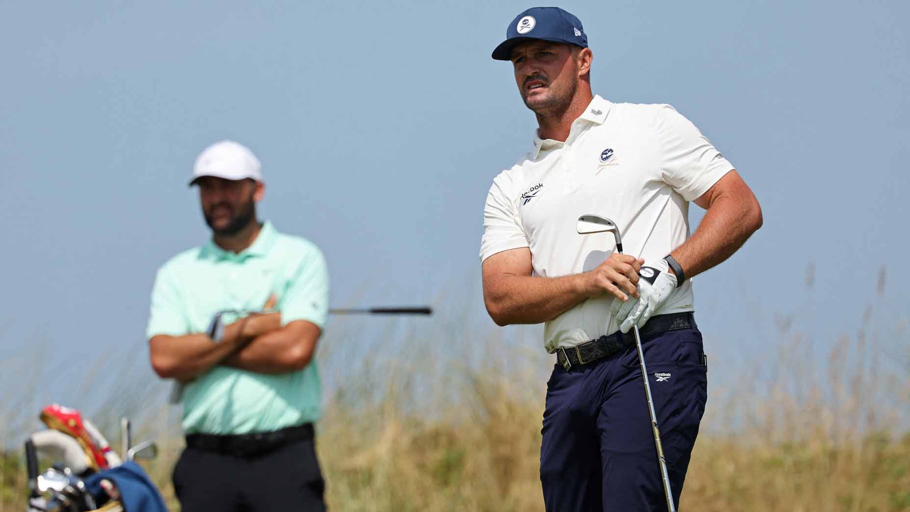 Bryson DeChambeau, with playing partner Scottie Scheffler in the background.