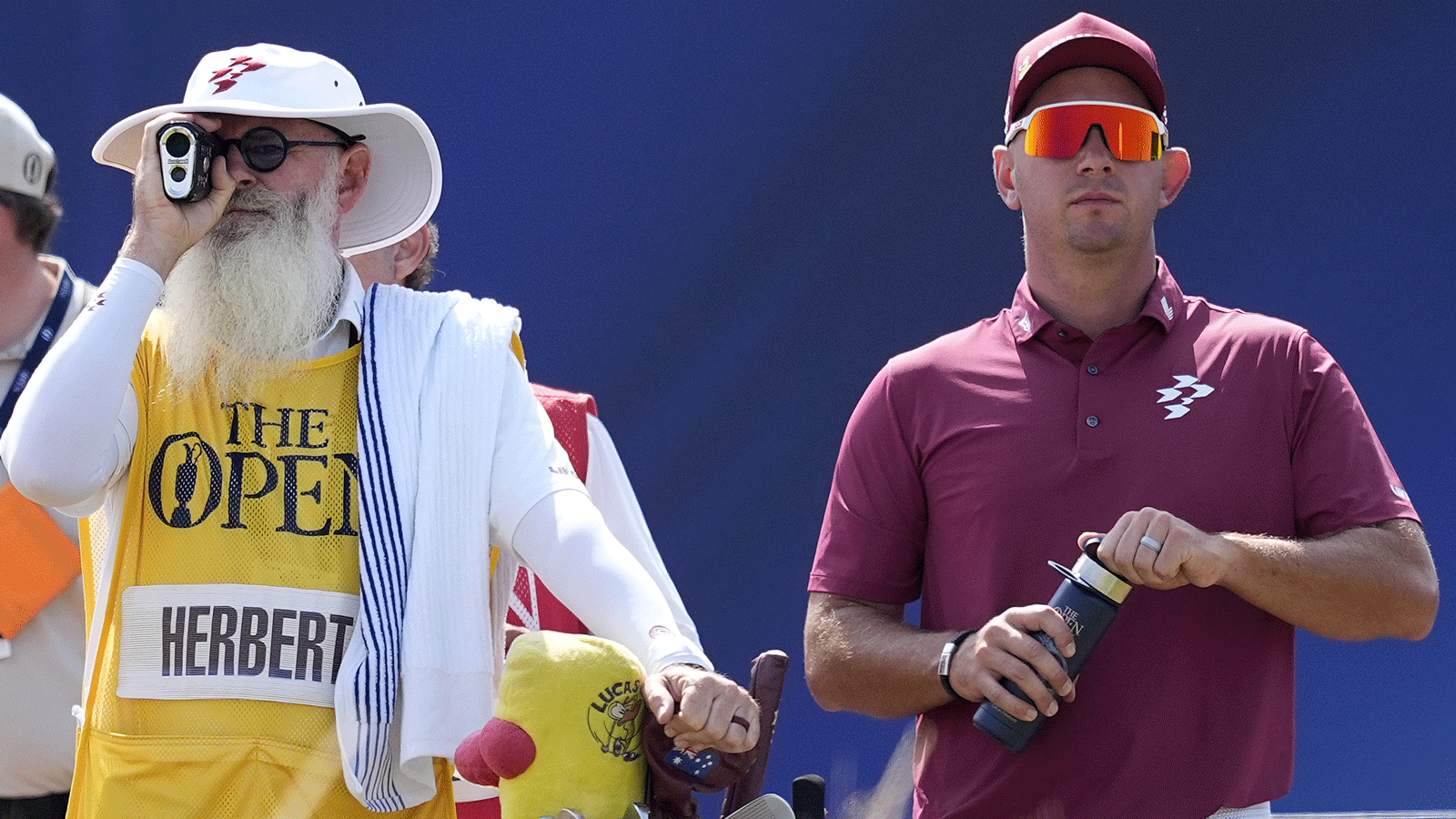 Rules debate swirls during Open leader's historic round, caddie shuts it down   