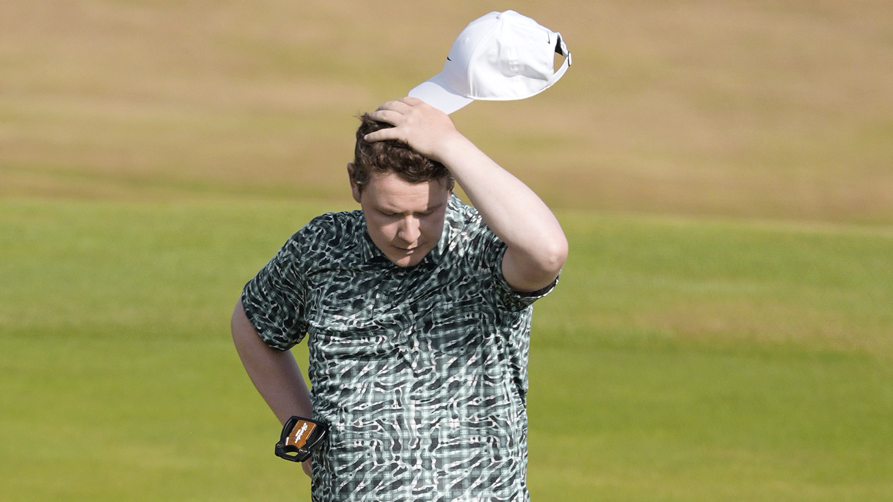 Robert MacIntyre of Scotland reacts after missing a birdie on the 9th green during day one of The 154th Open Championship at Royal Birkdale