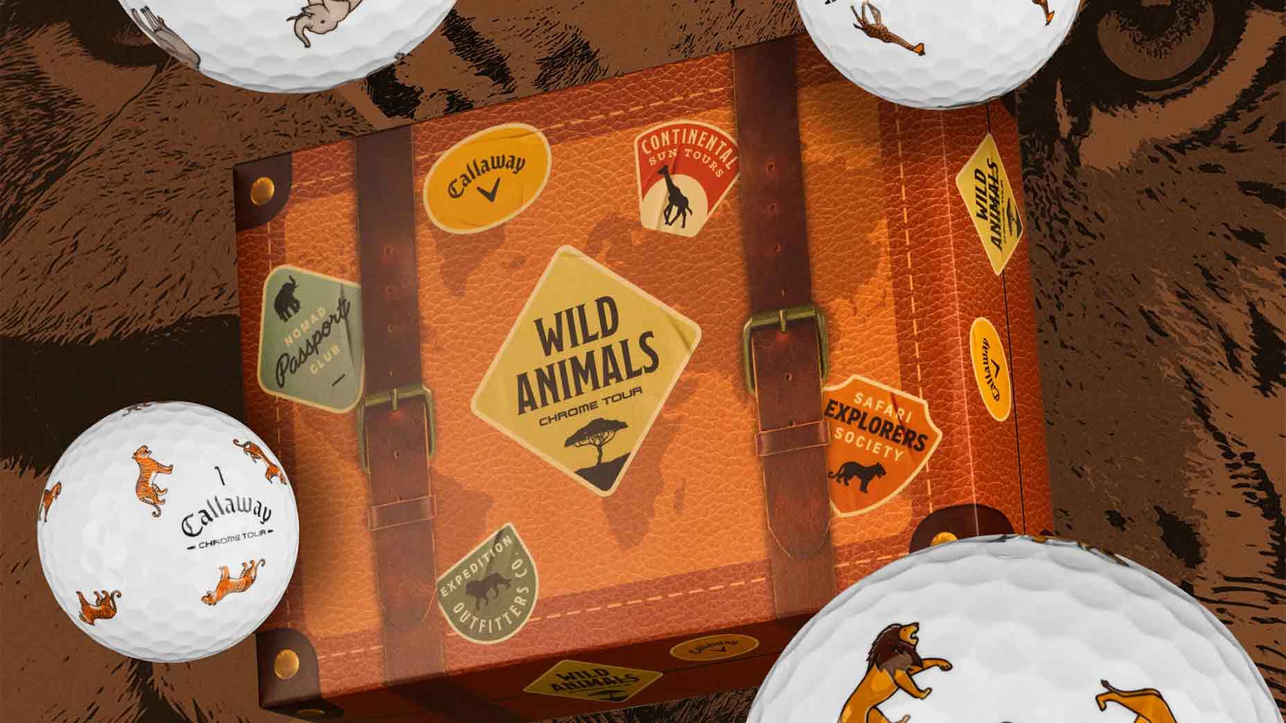 A brown suitcase with animal-themed stickers is surrounded by Callaway golf balls, each featuring cartoon wild animals. The background has an animal print pattern, making it a perfect display for any shop aiming to capture the spirit of adventure and playfulness.